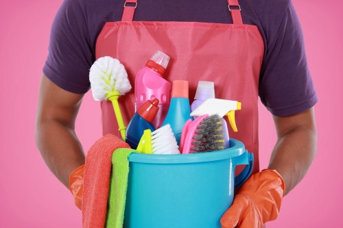 Cleaning team maintaining office washrooms and communal areas in Croydon